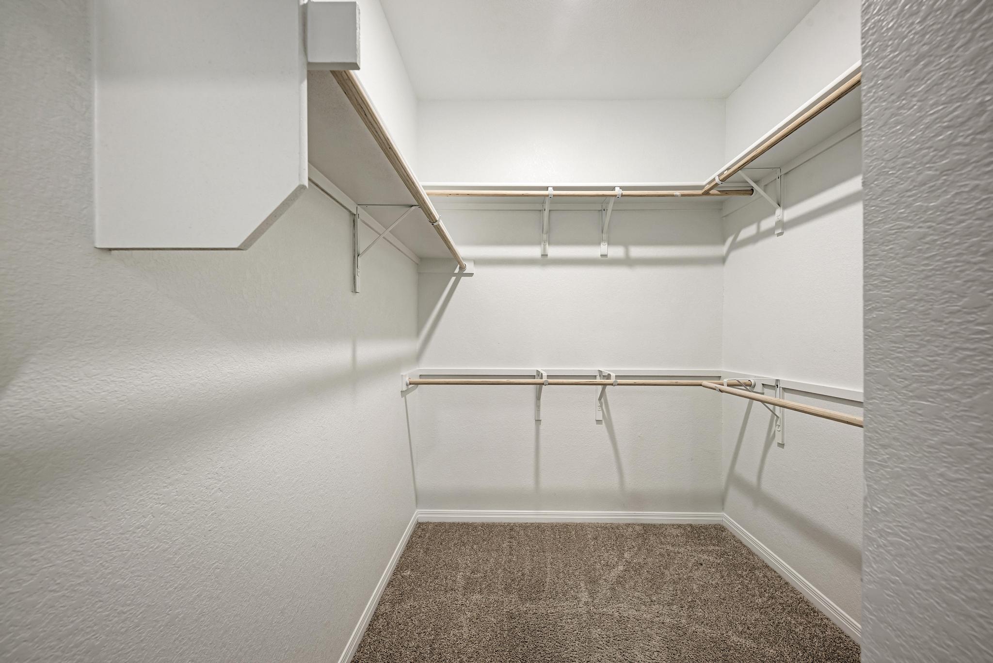 208 Abby Road Georgetown, TX 78626 - Photo 27 of 40 a view of an empty walk in closet