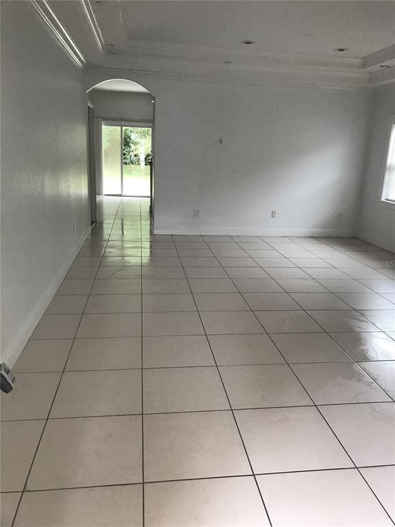 1911 May Street Brandon, FL 33510 - Photo 2 of 9 a view of an empty room and window