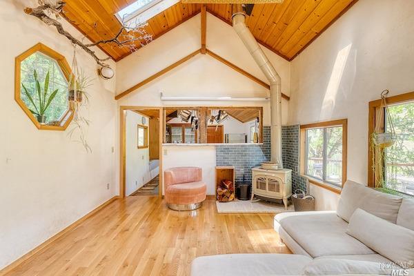 4015 2nd Gate Road Willits, CA 95490 - Photo 1 of 1 a living room with furniture and a large window