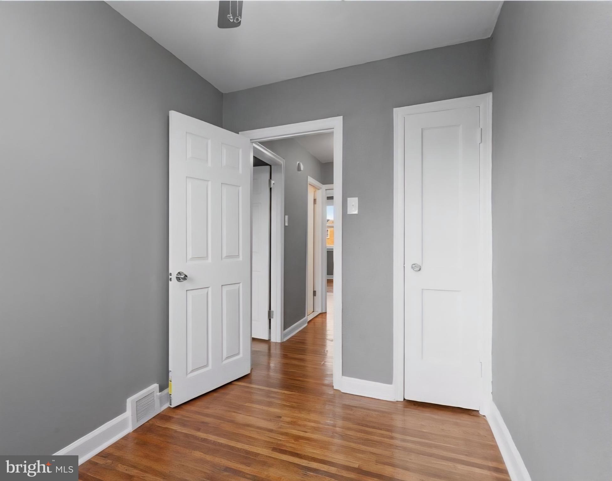 8332 Forrest Avenue Philadelphia, PA 19150 - Photo 14 of 19 a view of a hallway with wooden floor