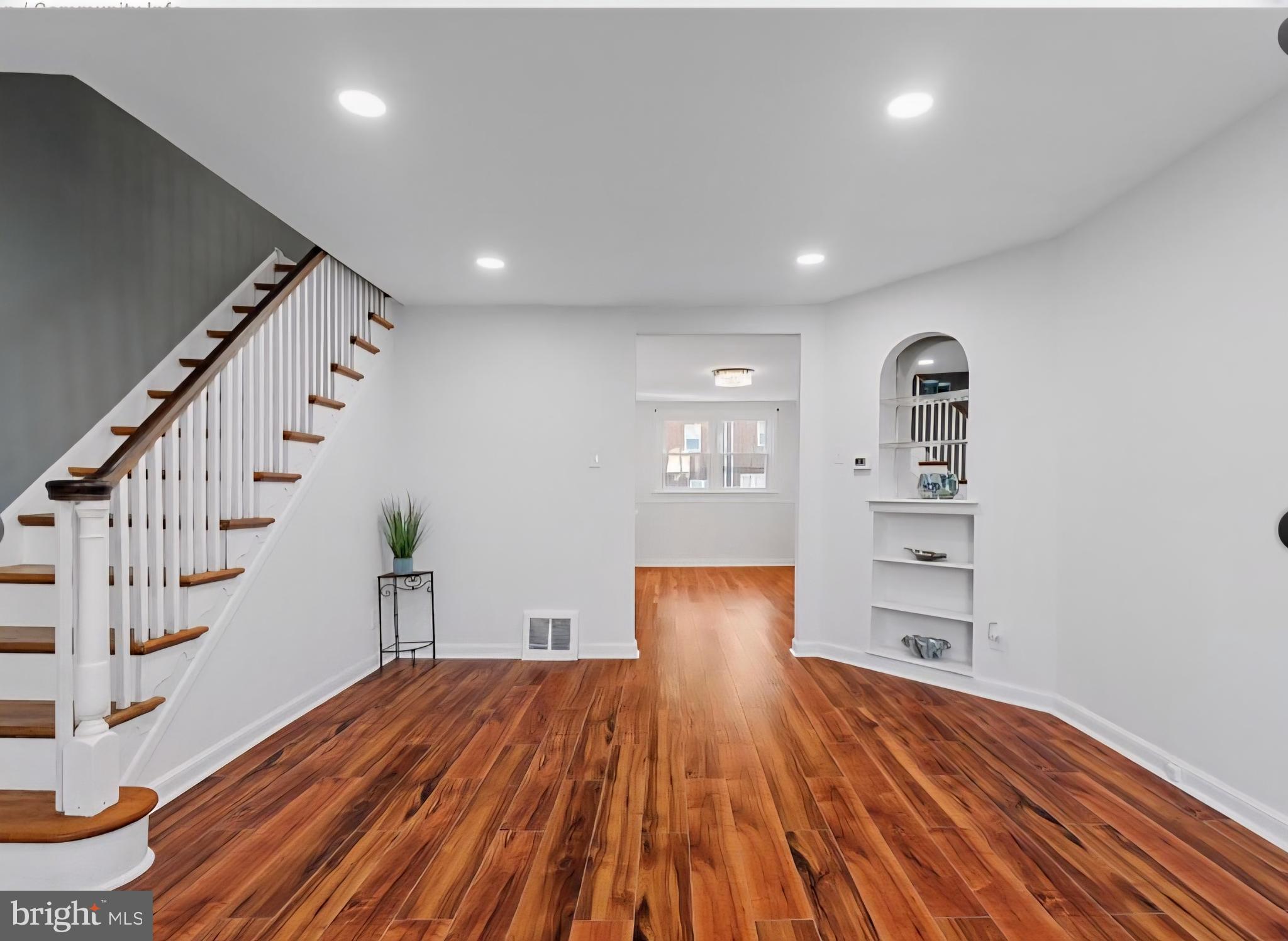 8332 Forrest Avenue Philadelphia, PA 19150 - Photo 2 of 19 a view of a room with wooden floor and staircase