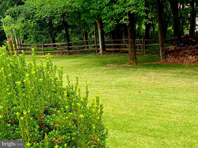 a room with furniture and a flat screen tv