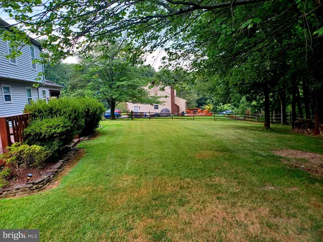 a bed room with a bed and a chandelier