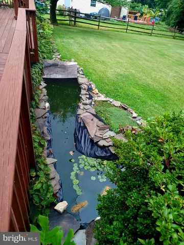 a bedroom with a bed and a lamp on table