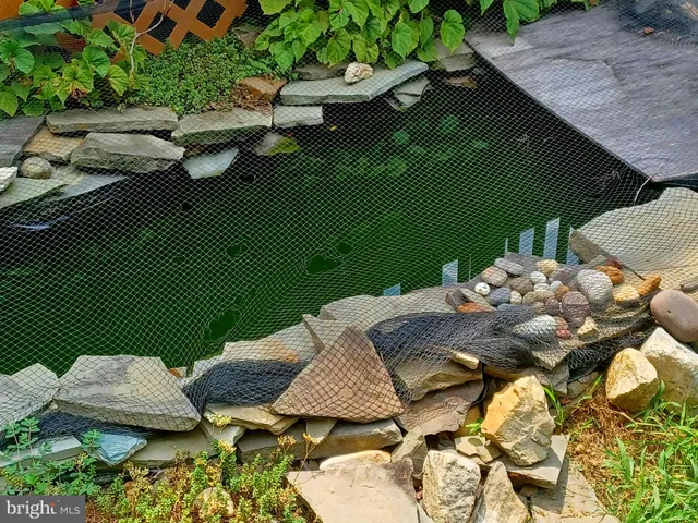a bathroom with a toilet and shower