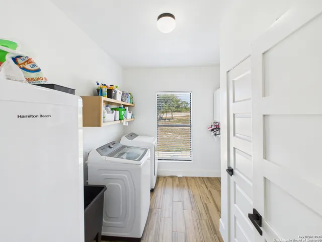 a room with a washer and dryer