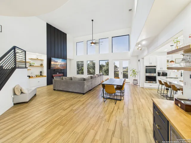 a living room with furniture and a table