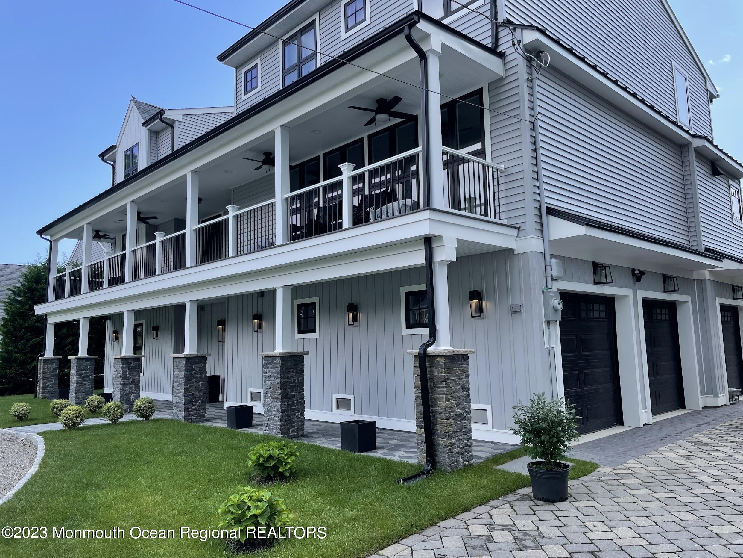 141 Osborn Avenue Bay Head, NJ 08742 - Photo 1 of 48 front view of a building with a yard