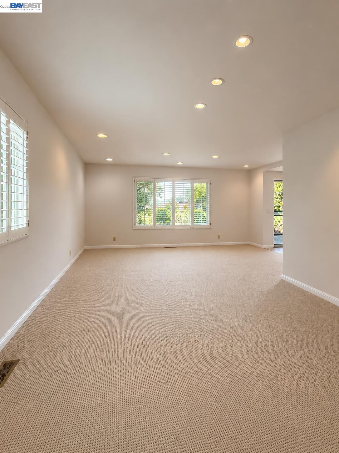 2516 Dos Rios Drive San Ramon, CA 94583 - Photo 6 of 14 an empty room with windows and mountain view