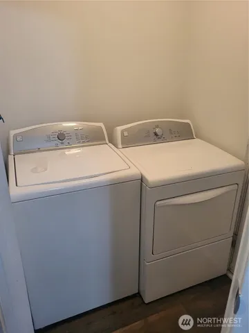a utility room with dryer and washer