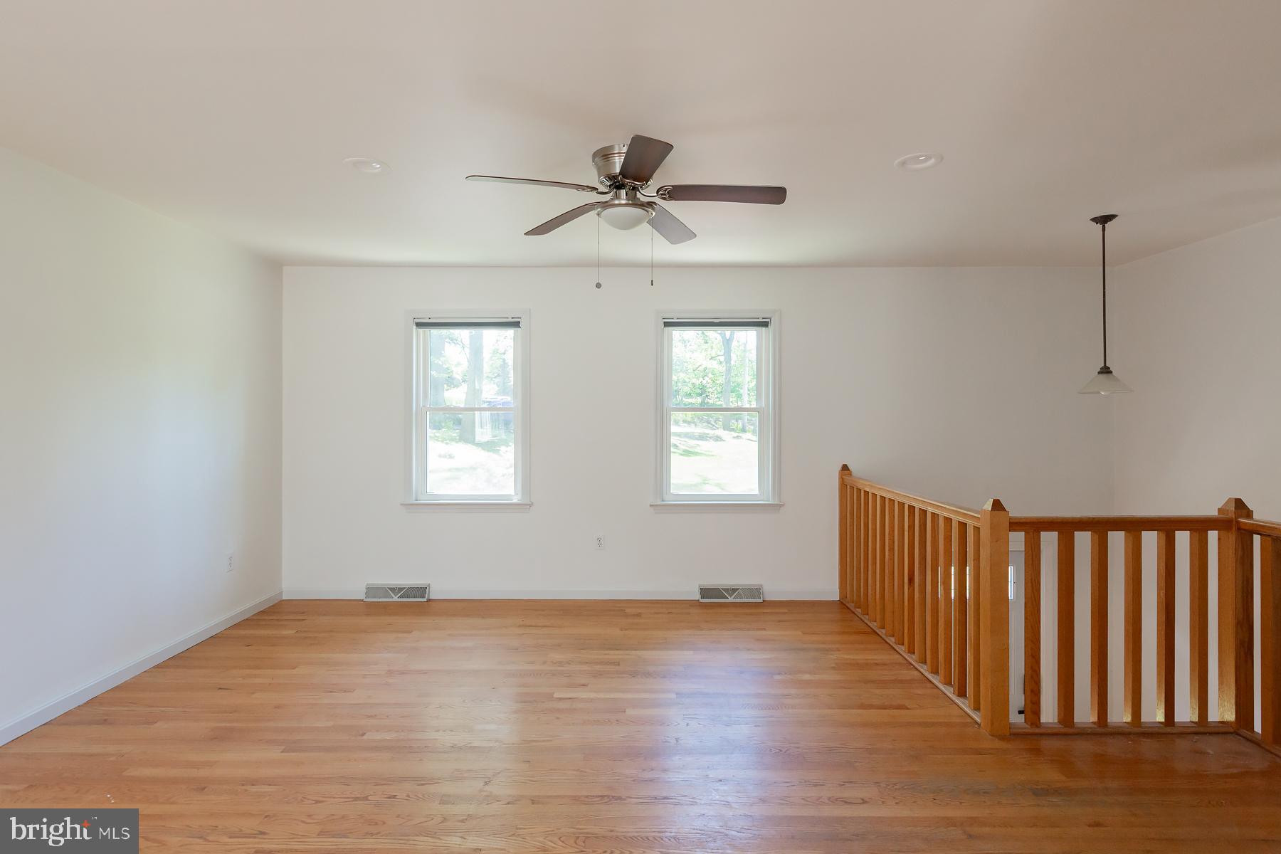 451 Red Hill Road Pequea, PA 17565 - Photo 11 of 52 wooden floor in an empty room with a window
