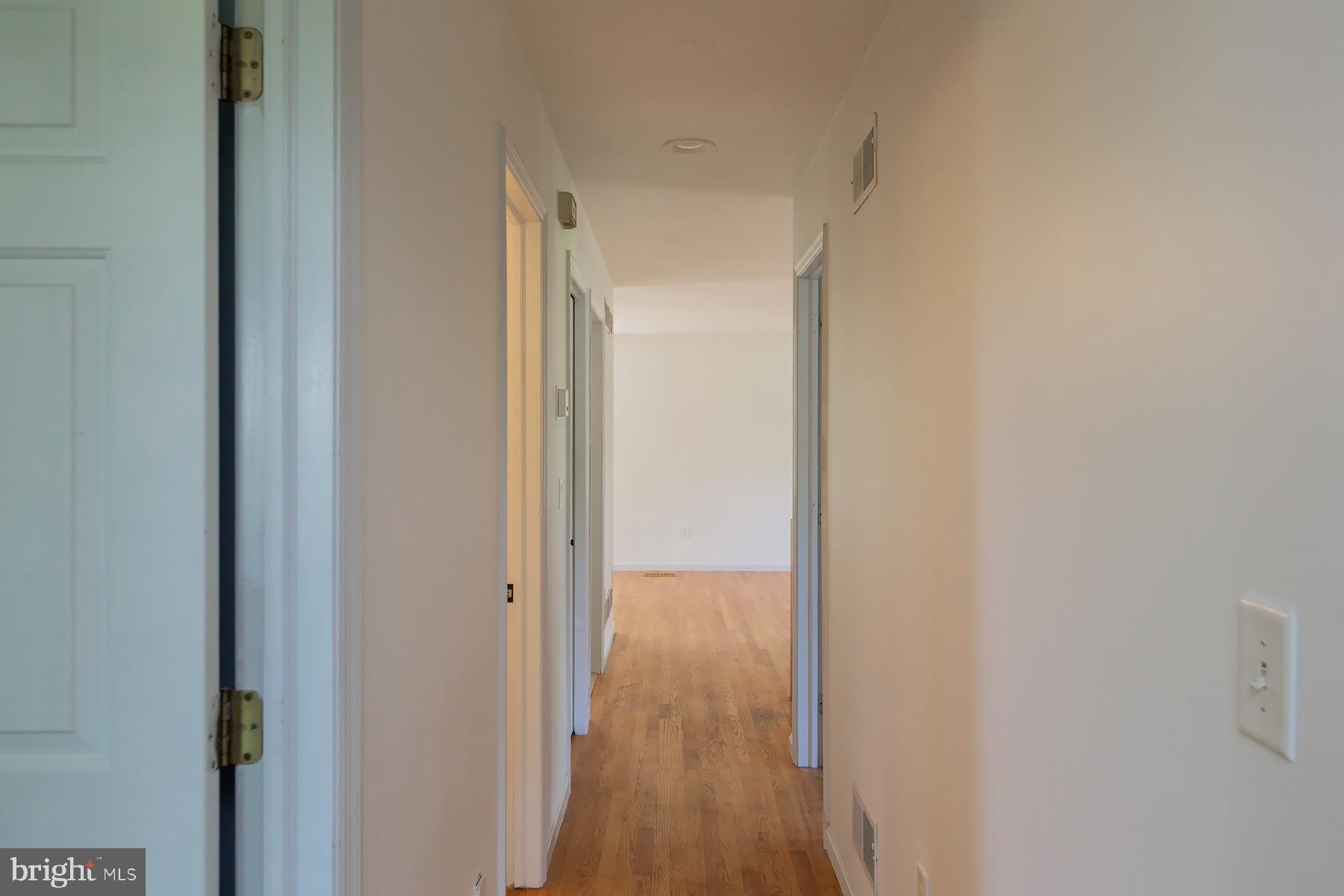451 Red Hill Road Pequea, PA 17565 - Photo 23 of 52 a view of a hallway with wooden floor