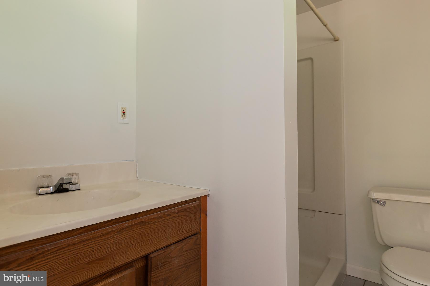 451 Red Hill Road Pequea, PA 17565 - Photo 29 of 52 a bathroom with a sink a toilet and a shower