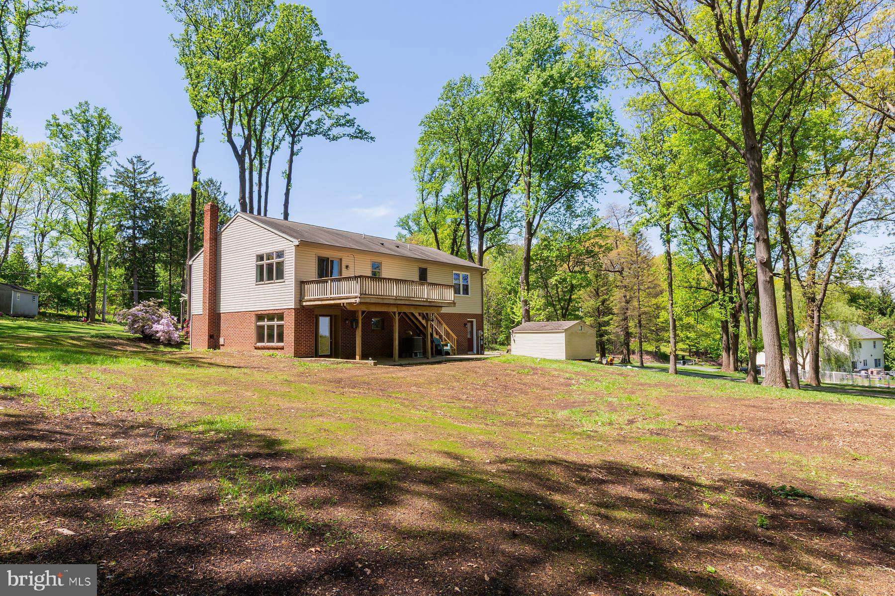 451 Red Hill Road Pequea, PA 17565 - Photo 41 of 52 a front view of a house with a yard and trees