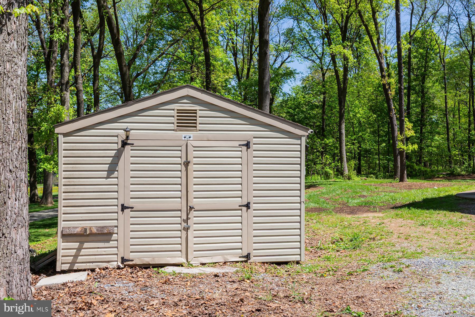 451 Red Hill Road Pequea, PA 17565 - Photo 49 of 52 a view of a house with a yard