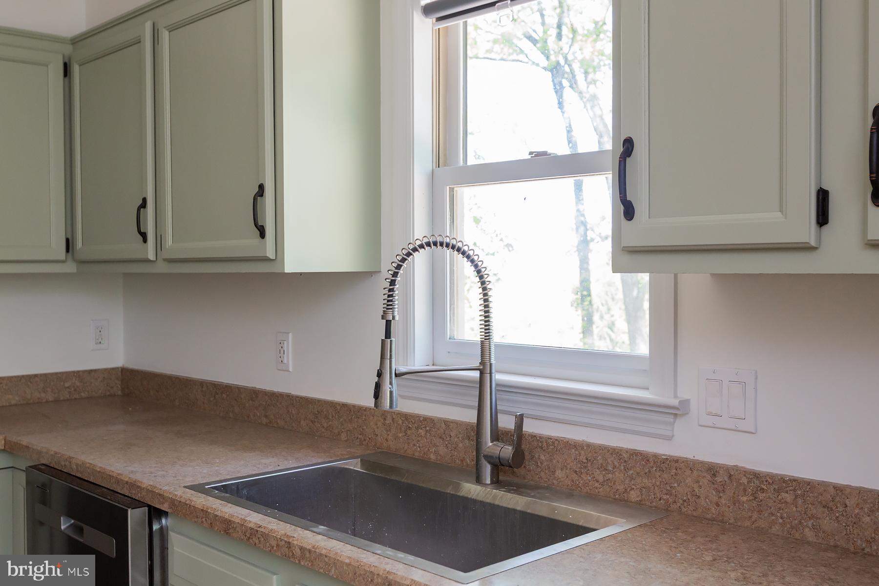 451 Red Hill Road Pequea, PA 17565 - Photo 5 of 52 a kitchen with granite countertop a sink and a window