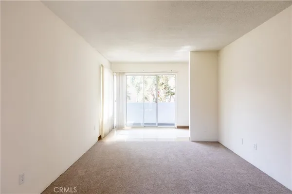 a view of empty room with front door