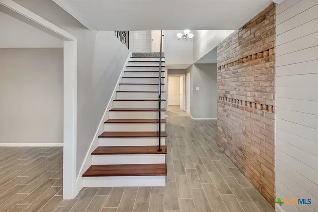 a view of entryway with wooden floor