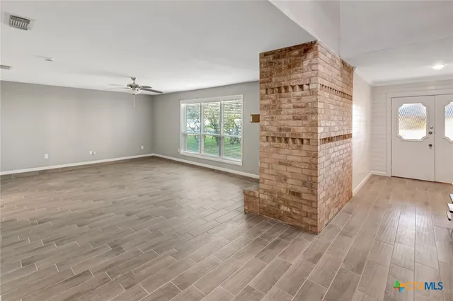 a view of fireplace and stairs