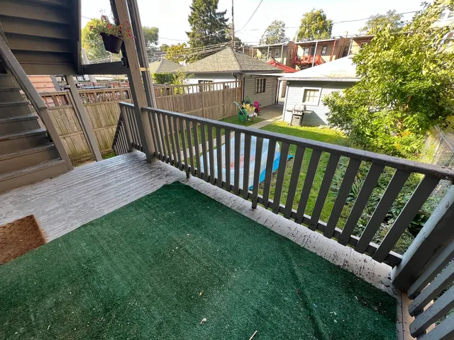a view of a garden with an outdoor seating