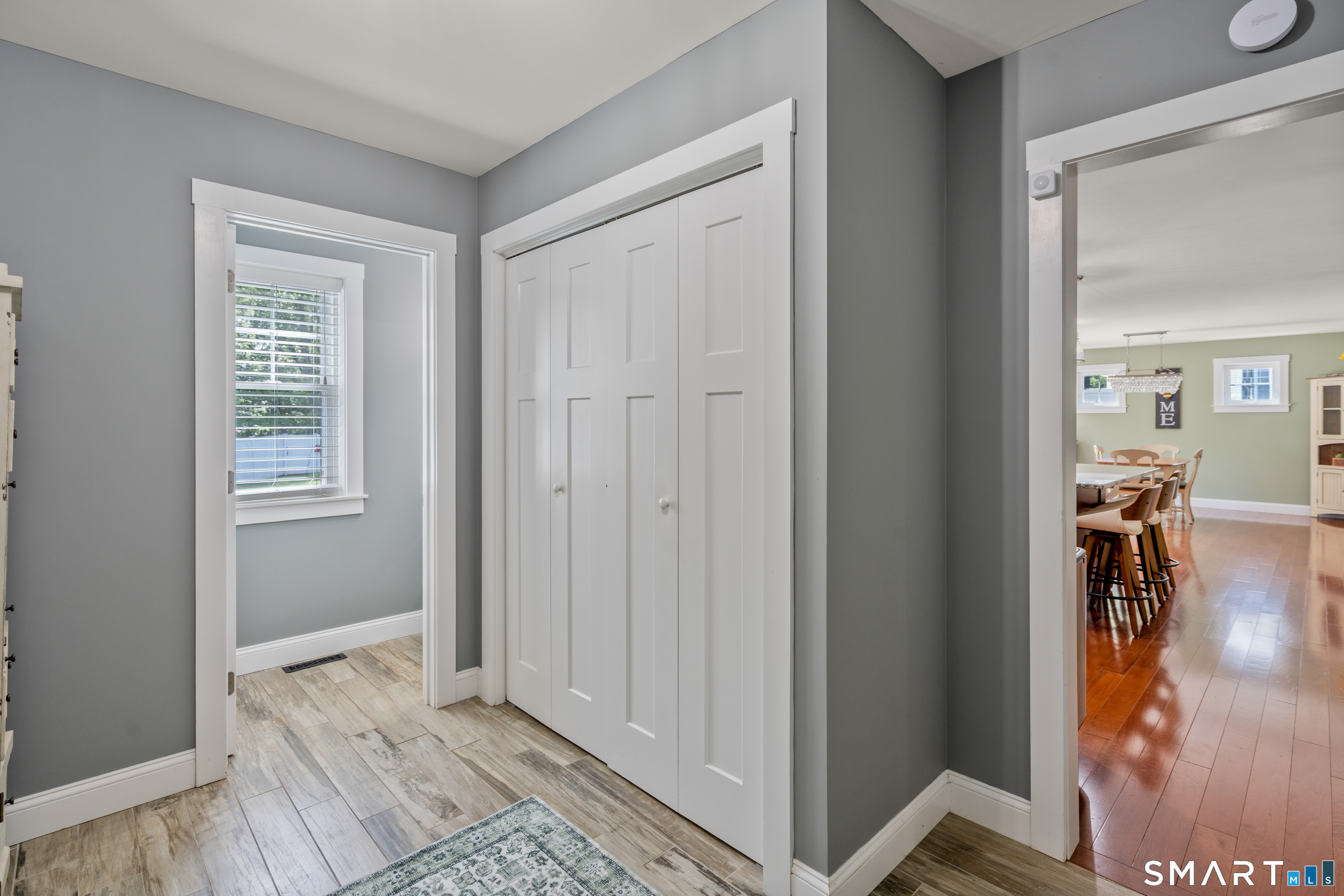 5 Limric Lane Suffield, CT 06078 - Photo 15 of 36 a view of a hallway view with wooden floor and a living room