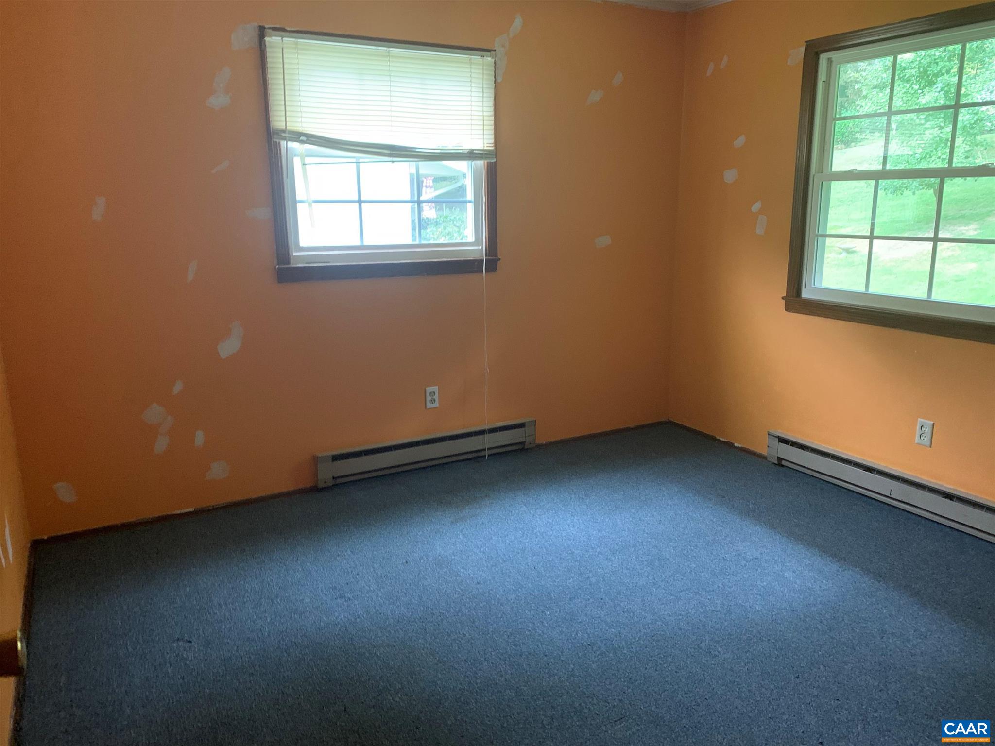 1509 Ricky Road Charlottesville, VA 22901 - Photo 7 of 10 an empty room with a window