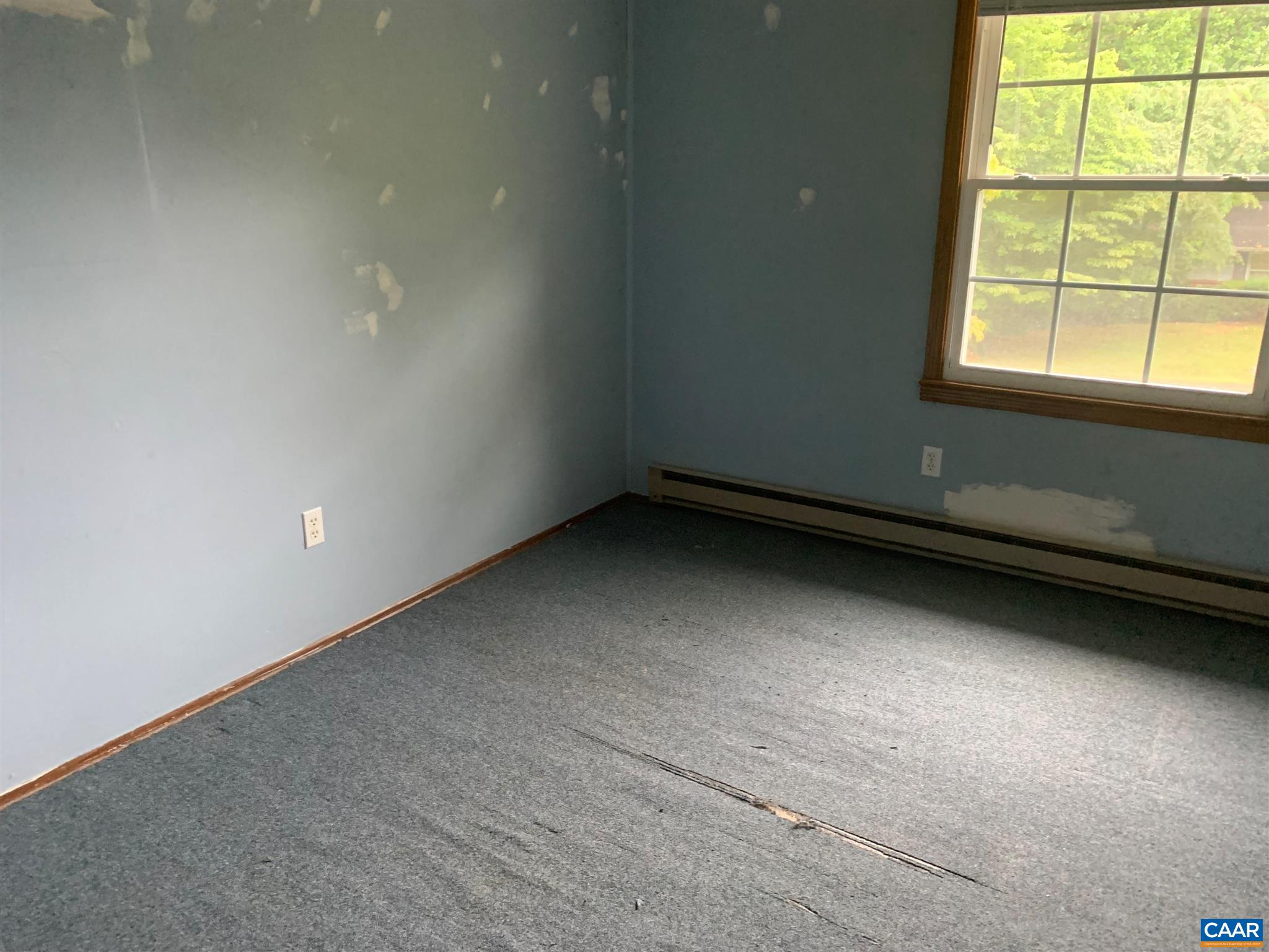 1509 Ricky Road Charlottesville, VA 22901 - Photo 8 of 10 an empty room with a window