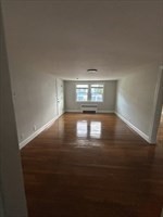 36 St Marks Road, Unit 3 Boston, MA 02124 - Photo 3 of 7 a view of an empty room with a window