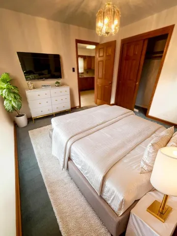 a bathroom with a tub and shower