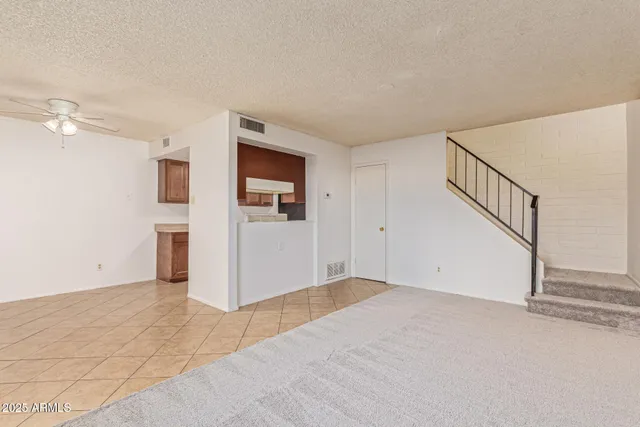 a view of a room with an empty space