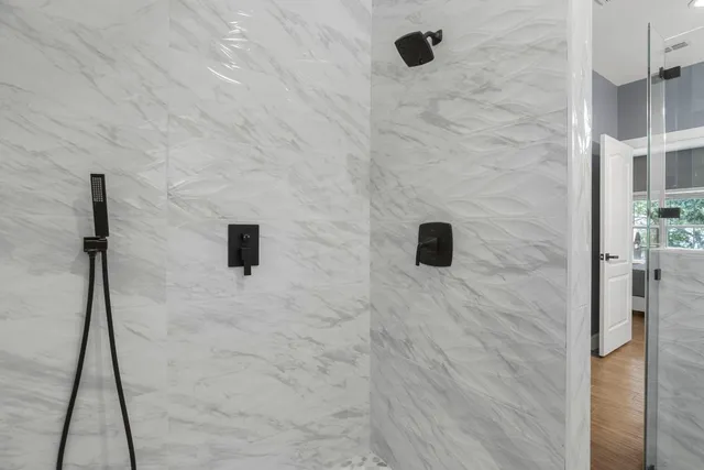 a bathroom with a double vanity sink and mirror