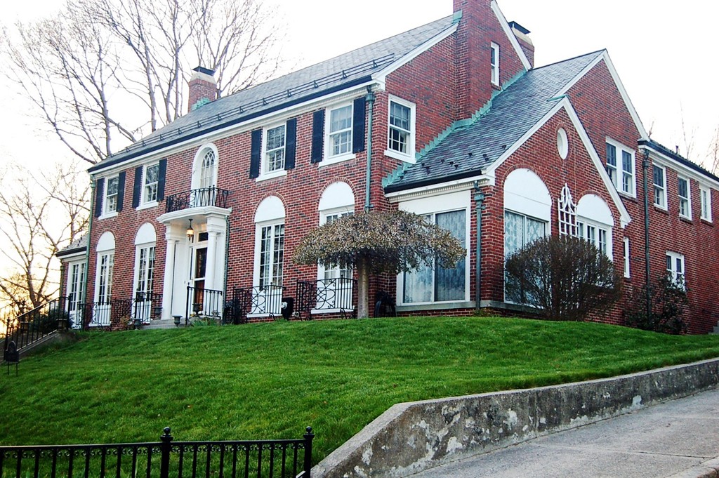 346 Gaskill Street Woonsocket, RI 02895 - Photo 1 of 25 a front view of a house with a garden