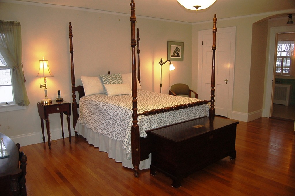 346 Gaskill Street Woonsocket, RI 02895 - Photo 16 of 25 a bedroom with a bed and wooden floor