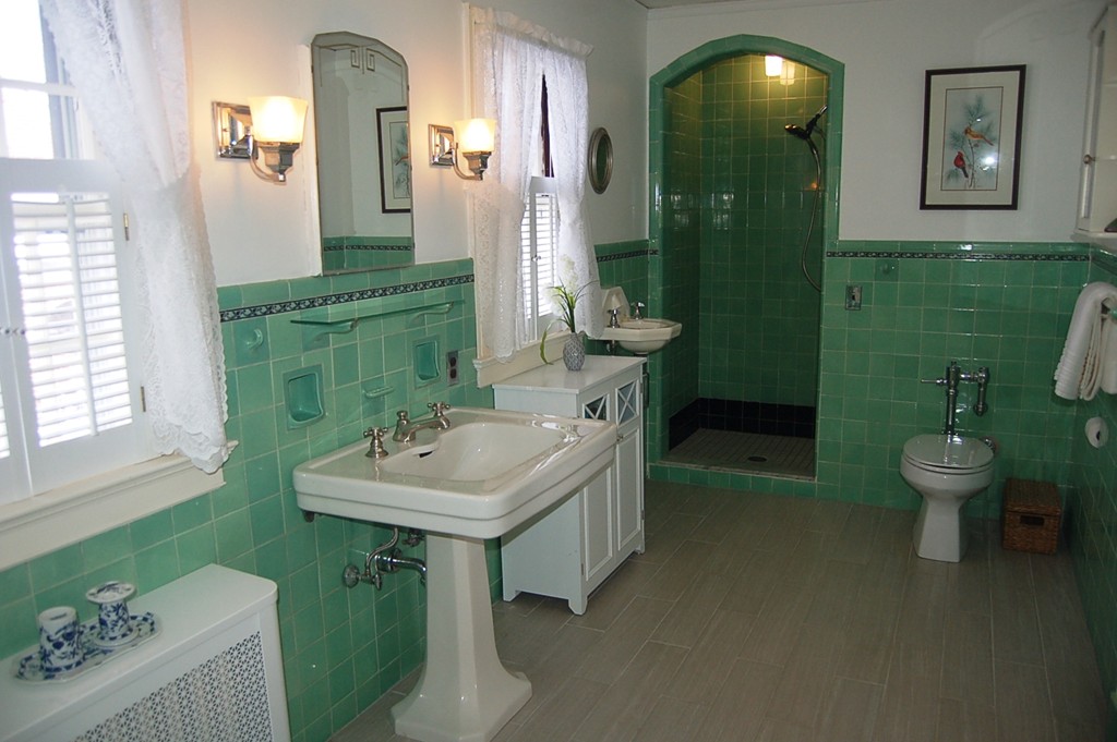 346 Gaskill Street Woonsocket, RI 02895 - Photo 17 of 25 a bathroom with a sink a toilet and mirror