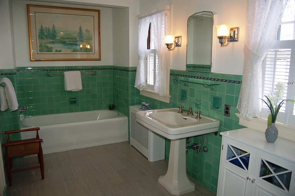 346 Gaskill Street Woonsocket, RI 02895 - Photo 18 of 25 a bathroom with a sink and a mirror
