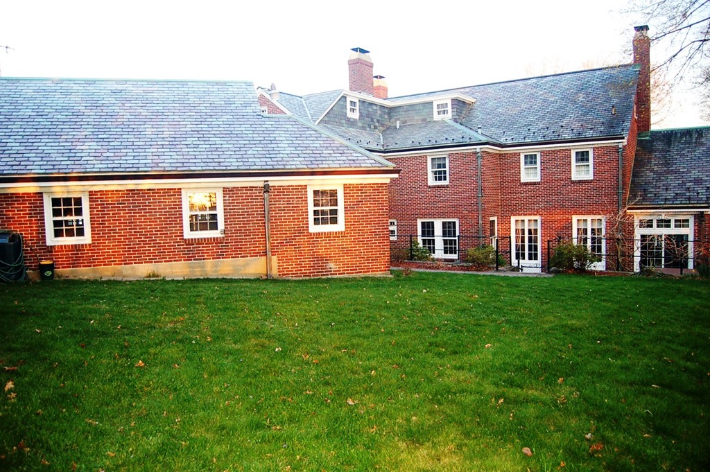 346 Gaskill Street Woonsocket, RI 02895 - Photo 24 of 25 a front view of a house with a yard