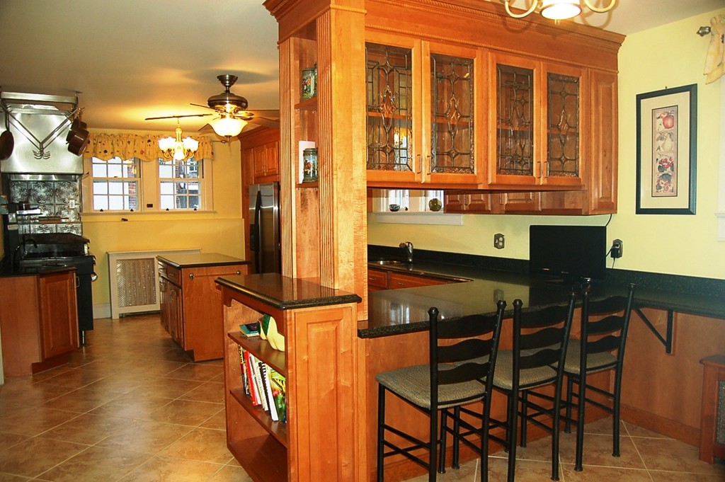 346 Gaskill Street Woonsocket, RI 02895 - Photo 4 of 25 a kitchen with a sink and cabinets