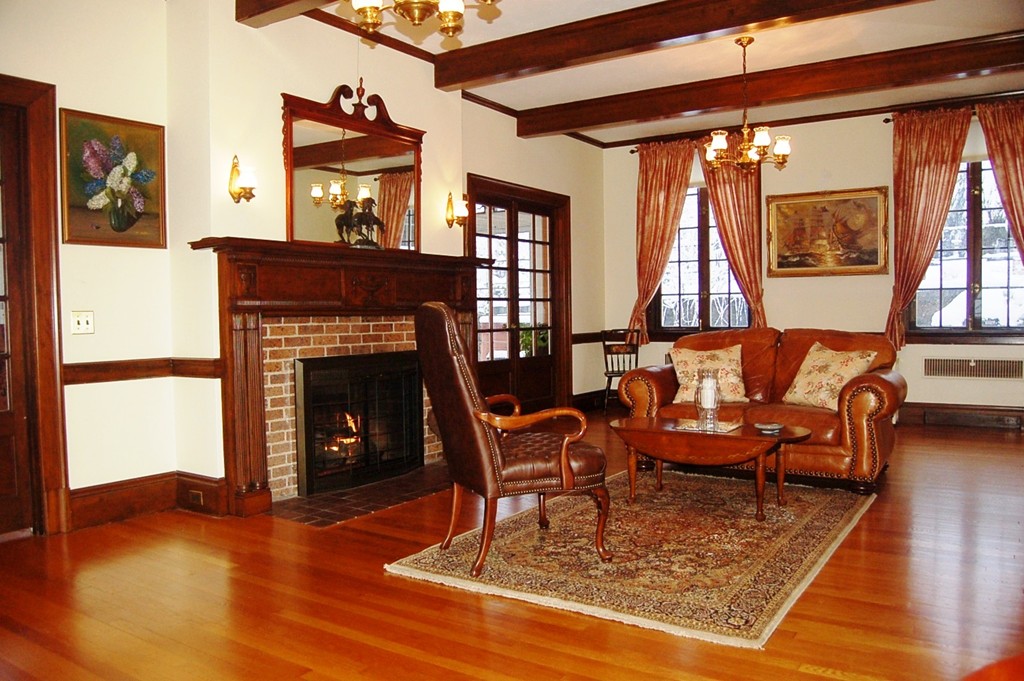 346 Gaskill Street Woonsocket, RI 02895 - Photo 8 of 25 a living room with furniture and a fireplace
