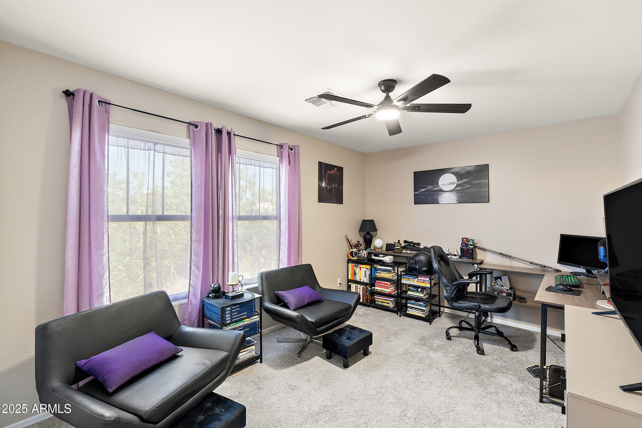 3643 West Medinah Court Anthem, AZ 85086 - Photo 18 of 58 a living room with furniture and a window