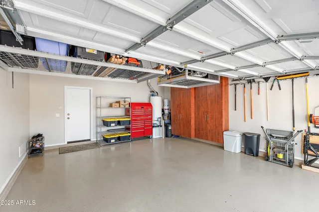 a bedroom with furniture and window