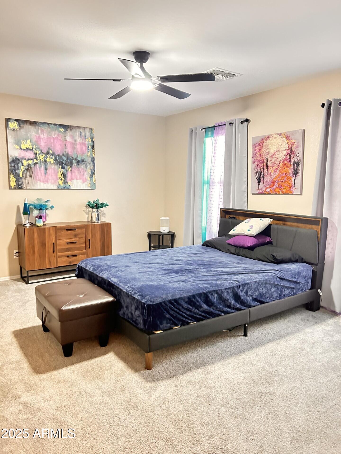 3643 West Medinah Court Anthem, AZ 85086 - Photo 26 of 58 a bedroom with furniture and window