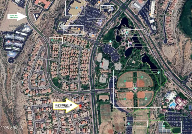 a kitchen with a refrigerator and a sink