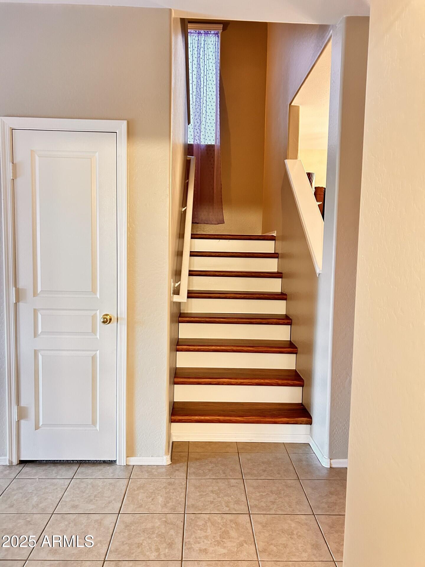 3643 West Medinah Court Anthem, AZ 85086 - Photo 37 of 58 a view of entryway with wooden floor and stairs