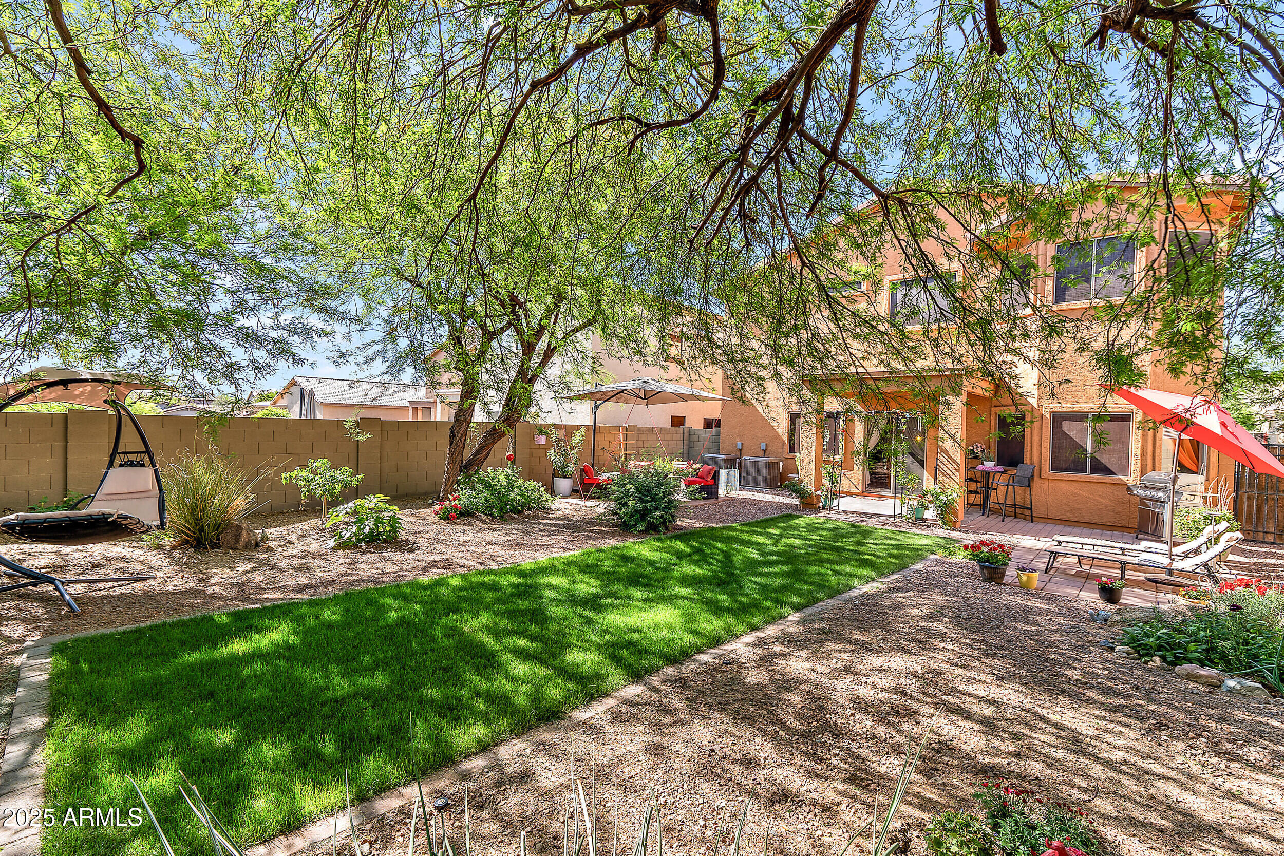 3643 West Medinah Court Anthem, AZ 85086 - Photo 41 of 58 a front view of a house with garden