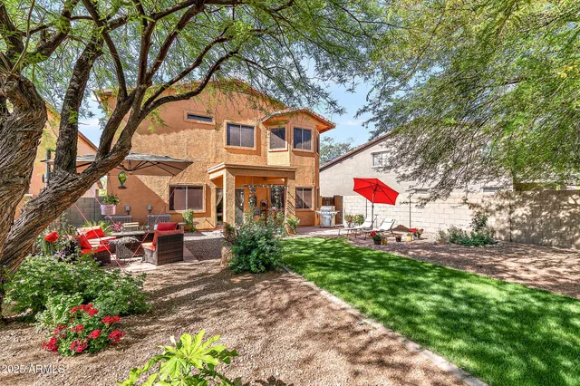 a view of a lake with boats and trees