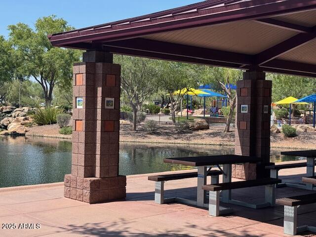 3643 West Medinah Court Anthem, AZ 85086 - Photo 48 of 58 a view of a swimming pool with a patio
