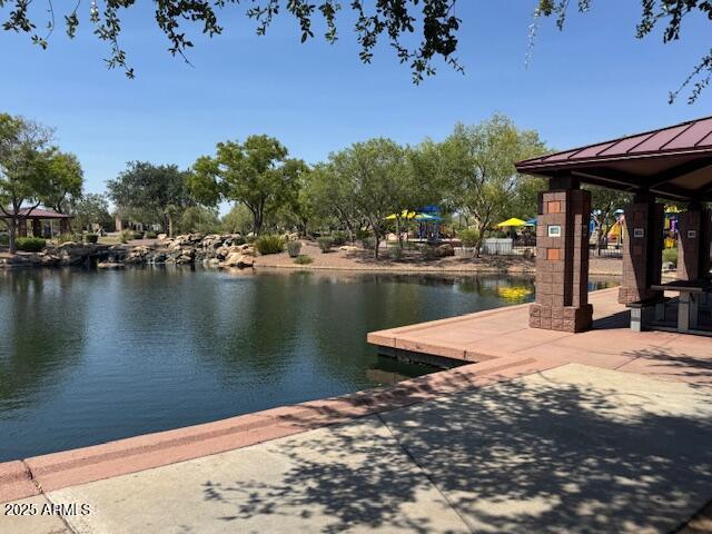 3643 West Medinah Court Anthem, AZ 85086 - Photo 49 of 58 a view of a lake with houses