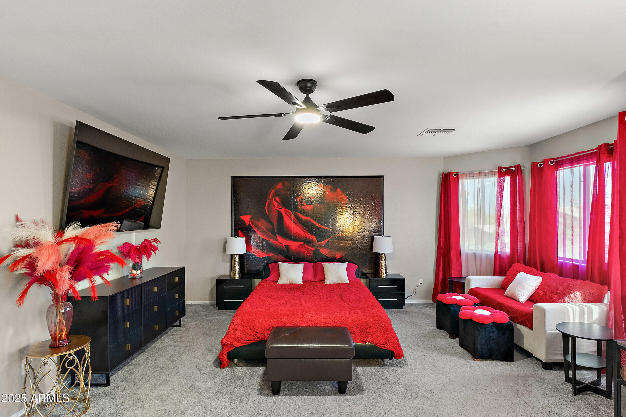 3643 West Medinah Court Anthem, AZ 85086 - Photo 9 of 58 a bedroom with furniture and a flat screen tv