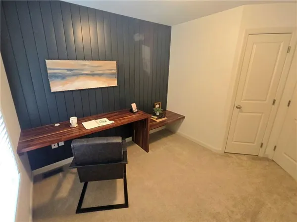 a room with a table and a projector