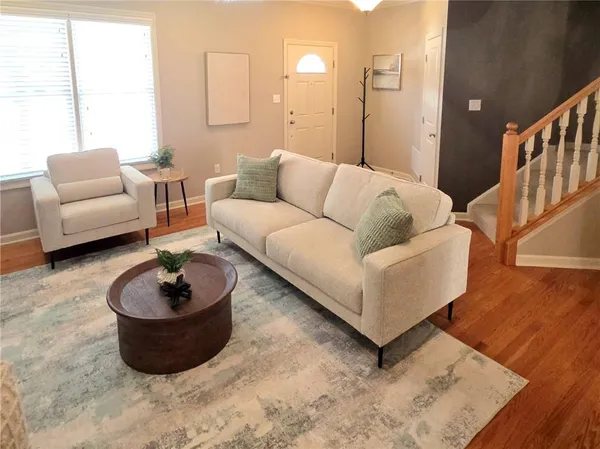 a living room with furniture and a couch